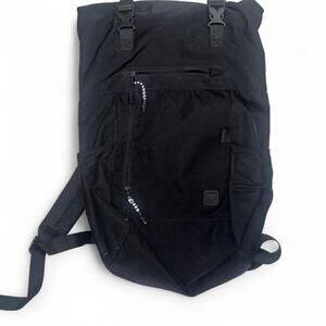 Fabletics black streetwear backpack Rolls up for easy storage